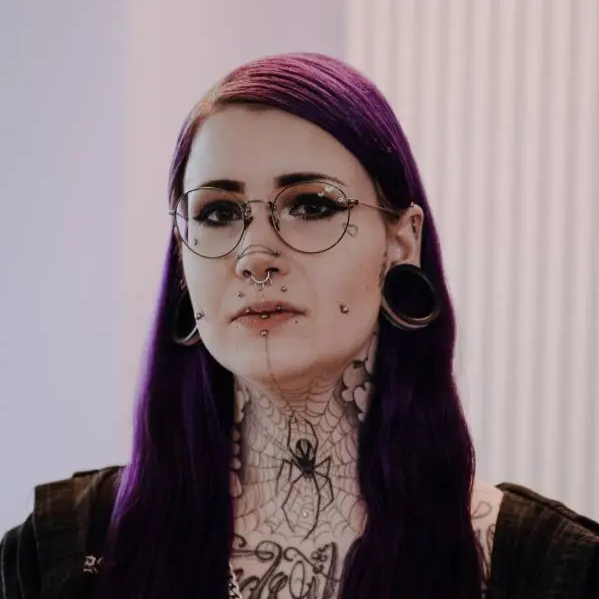 Portrait of Diana, Shop Assistant at Ragequit Tattoo Piercing Zurich